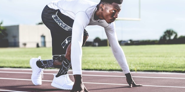 man-running-track