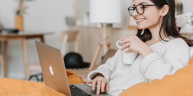 woman-smiling-at-laptop